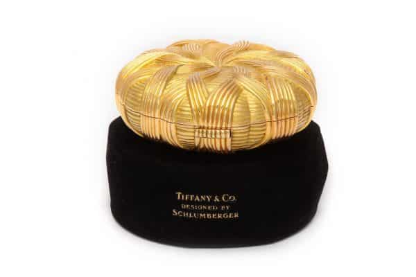 schlumberger 18k gold wave compact