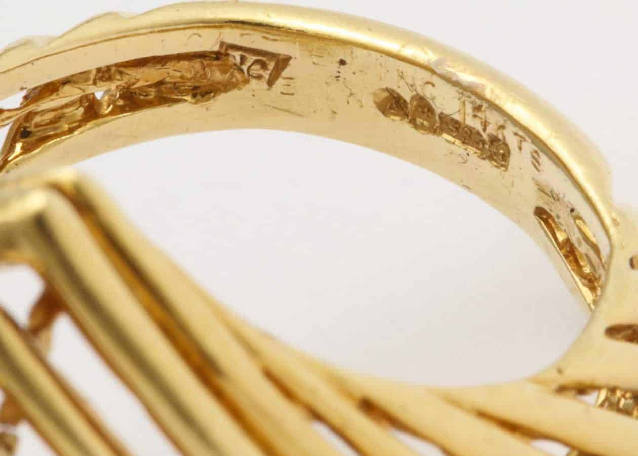 cartier geometric gold ring | dkfarnum